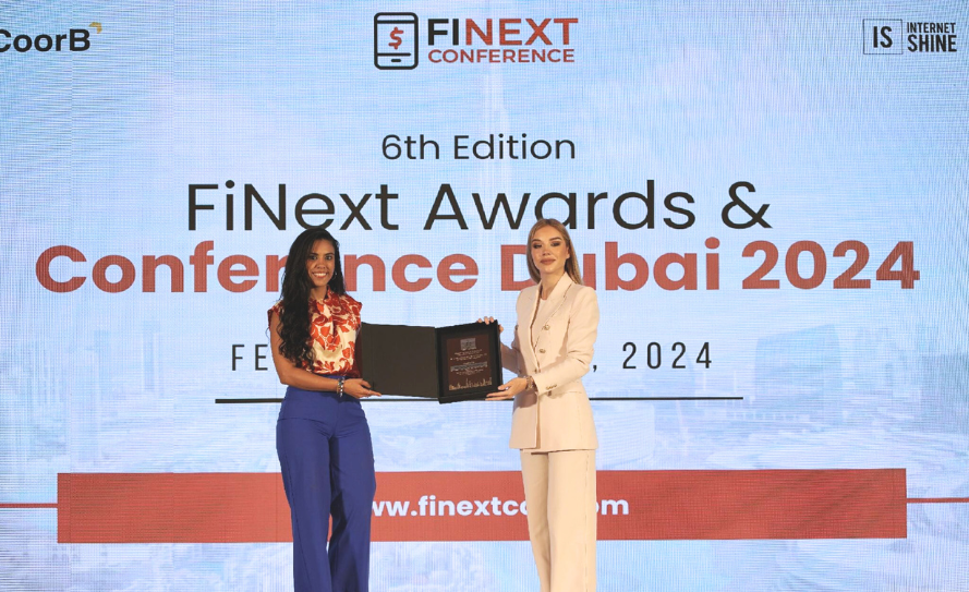 Fabiola Luque Morales, UP Economics graduate, wins the Professional Global Award at the FiNext Conference Dubai 2024